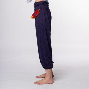 Pantalón bombacho morado con flecos R