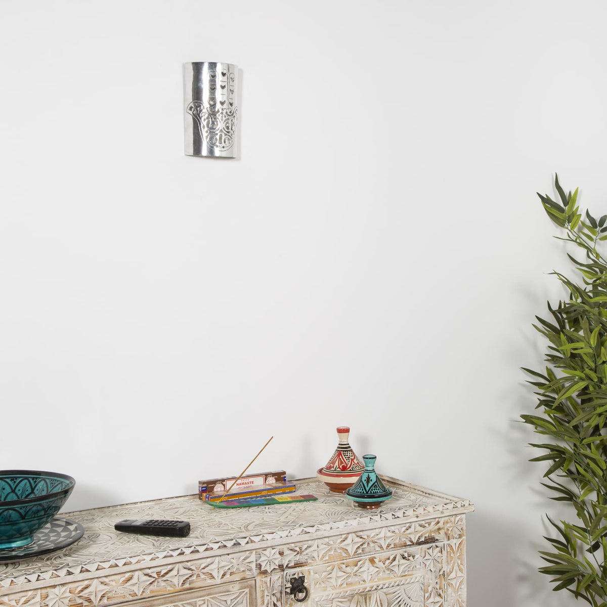 aplique mano fátima escenario