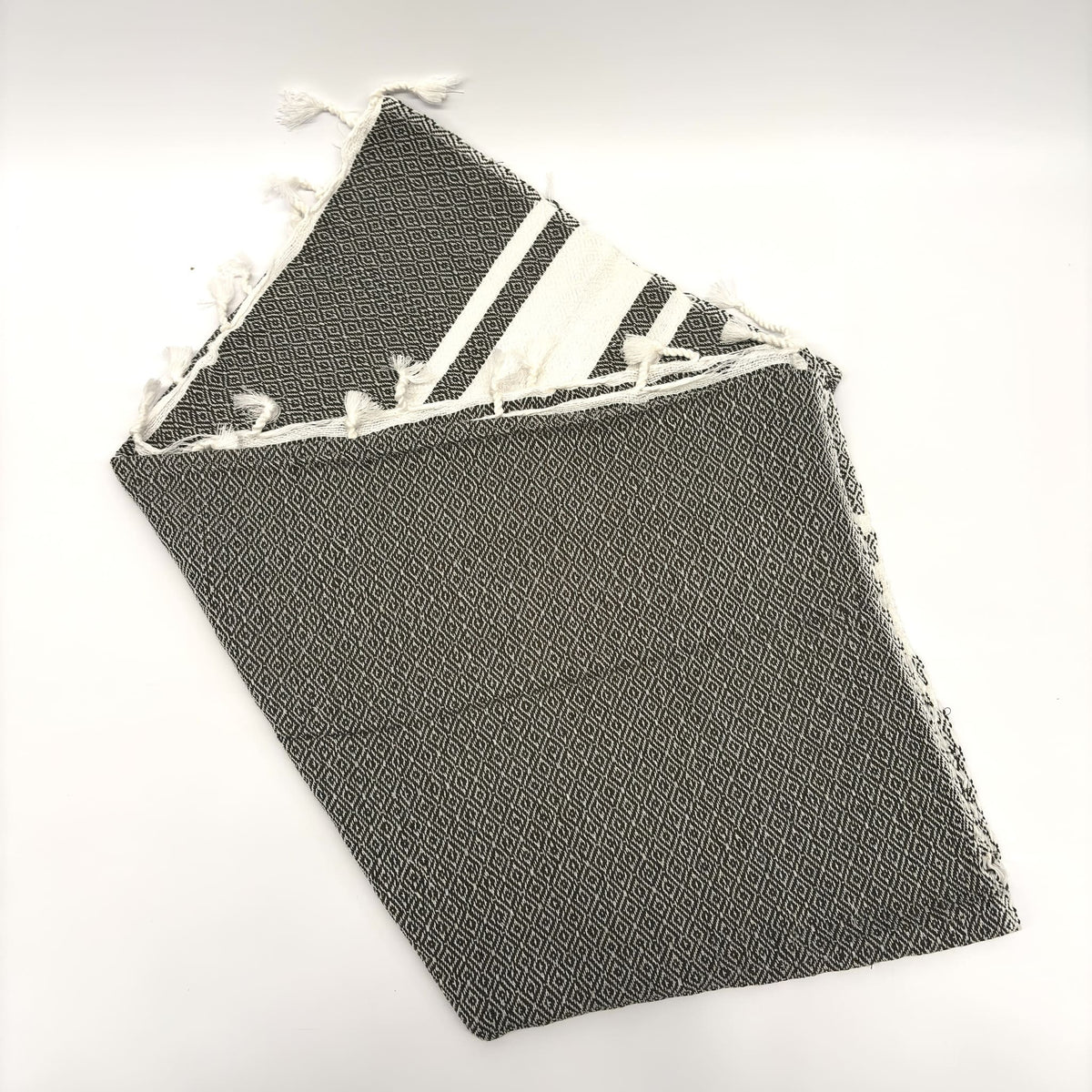 colcha marrakech gris plegada