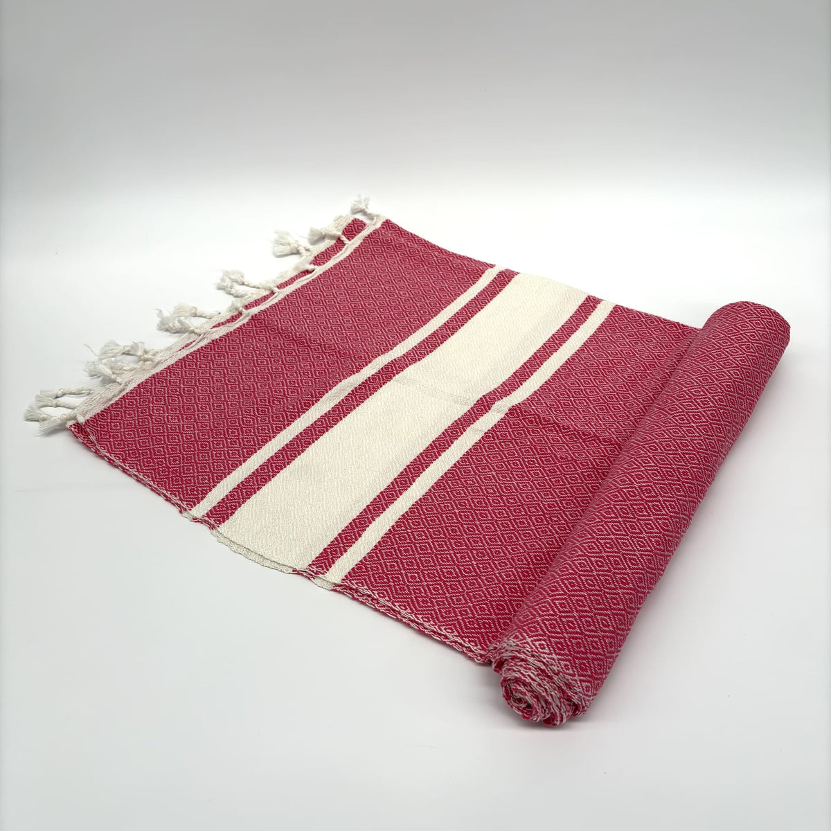 colcha marrakech rosa enrollada