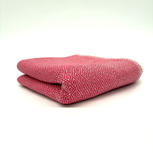 colcha marrakech rosa plegada