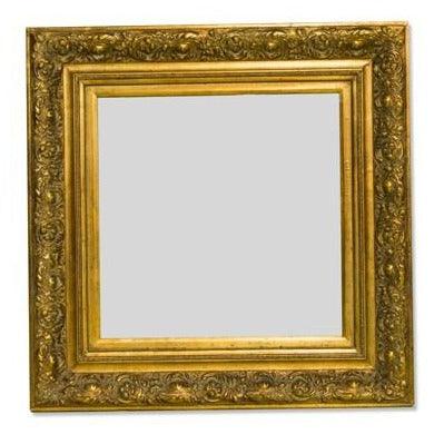 Espejo árabe tradicional de madera dorada