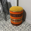 Taburete bereber de madera tapizado con motivos étnicos video
