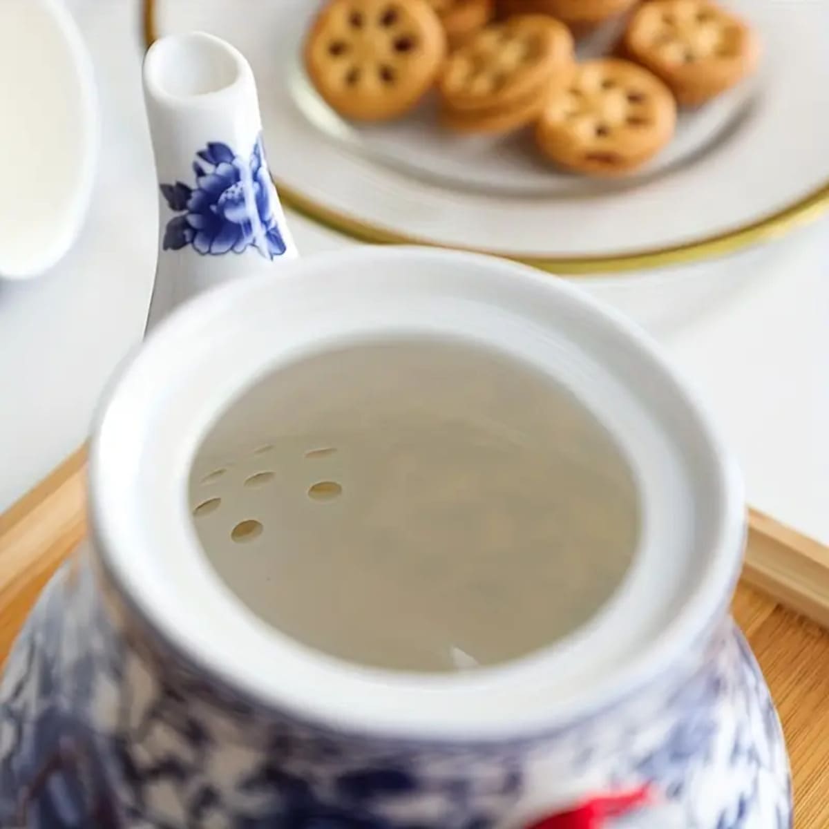 tetera floral cerámica oriental detalle