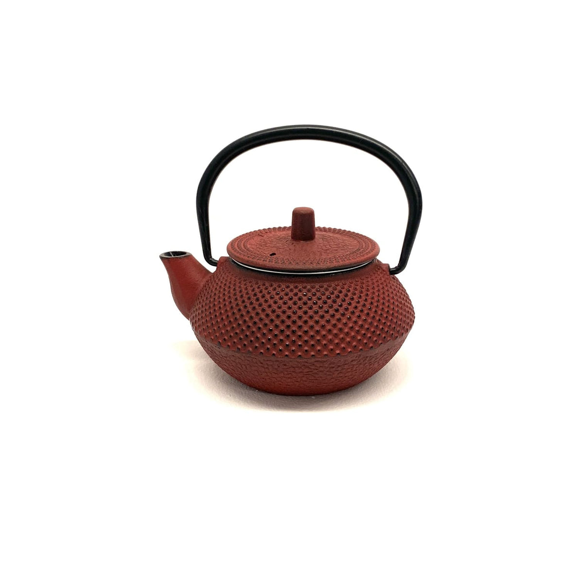 Tetera japonesa de hierro fundido rojo