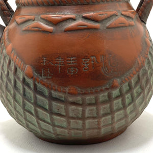 Tetera oriental de cerámica con filtro